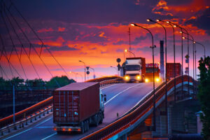 truck with container rides on the road